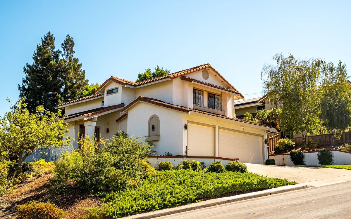 Representative Alder Manor San Carlos home on a hillside street with mature trees