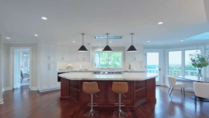 Gourmet kitchen with marble island in a Los Altos Hills estate