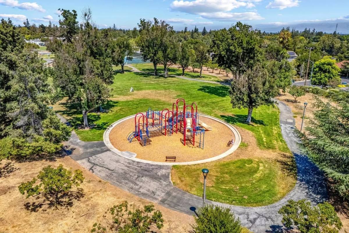 Neighborhood park playground and green lawn in Sunnyvale