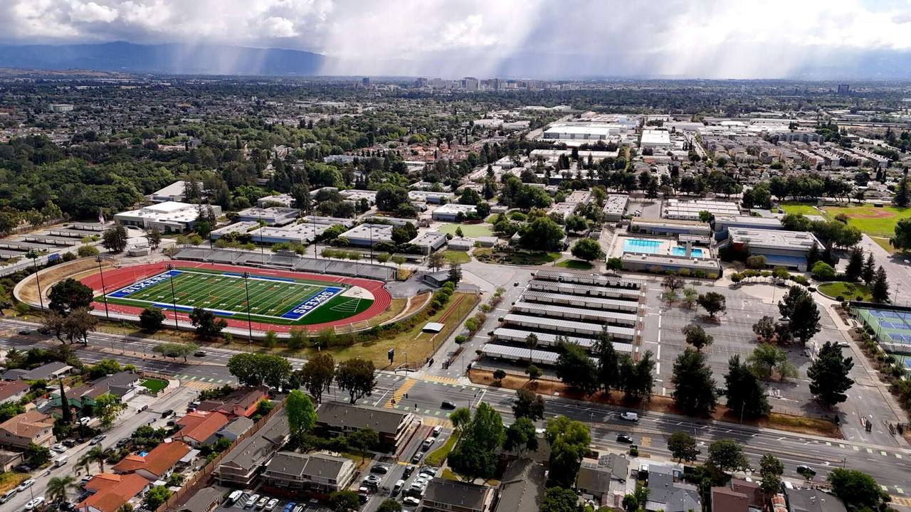 California high school campus with oak trees