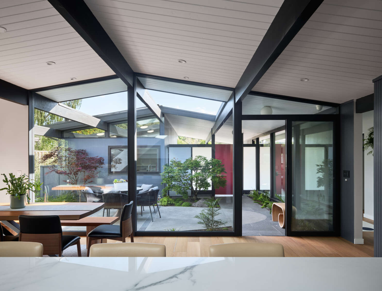 Mid-century modern home with glass walls in Rancho Rinconada