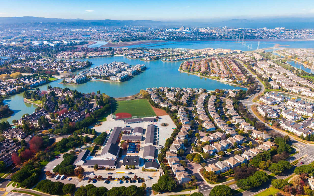 Waterfront home exterior in Redwood Shores at dusk